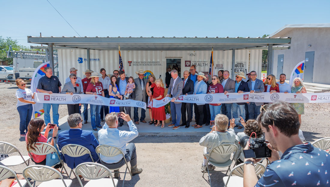 Ribbon cutting of shipping container office in Fort Davis