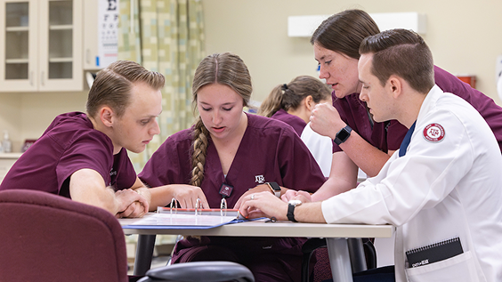 Group of students studying at a table